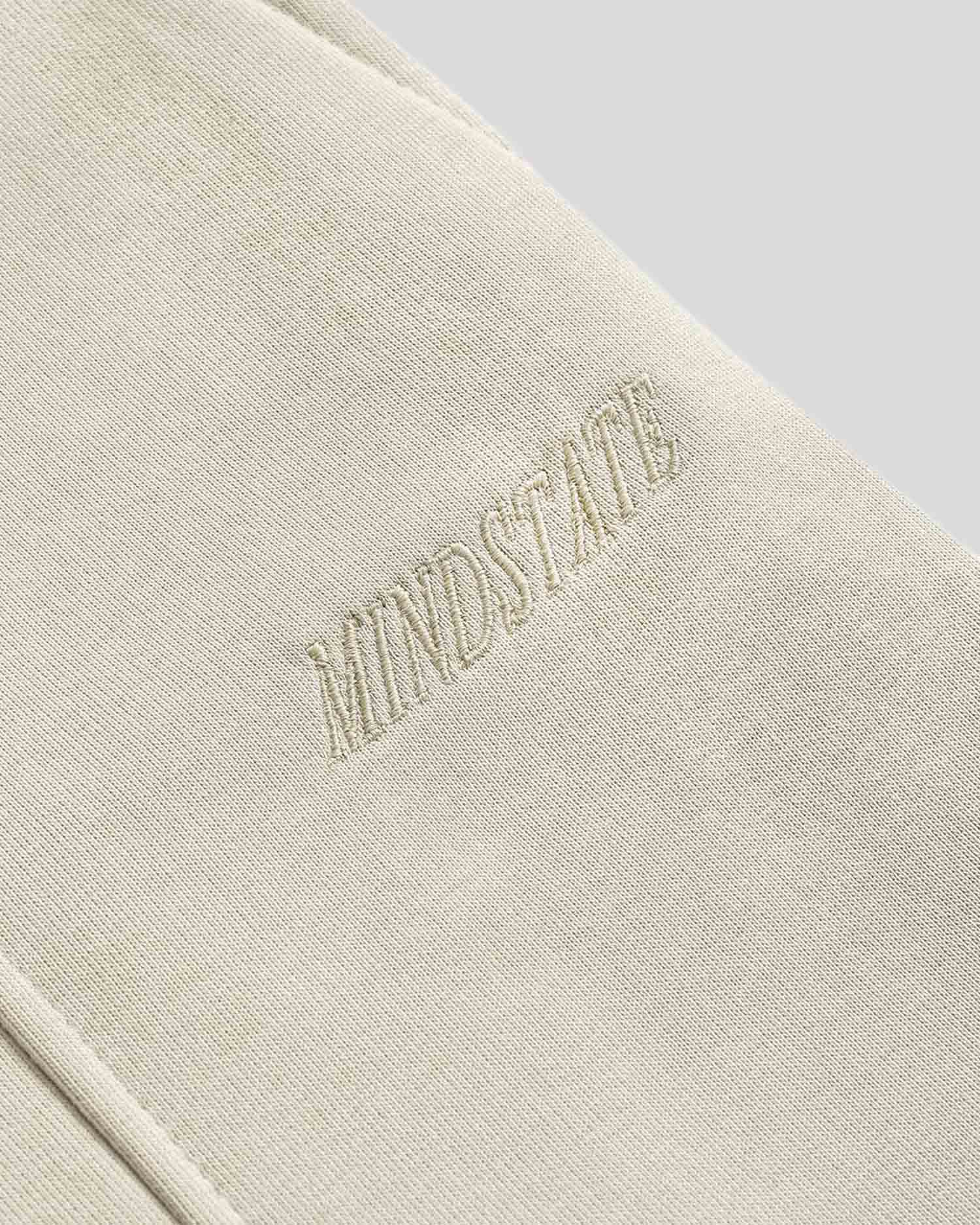 Wide-fit sweatpants (beige)